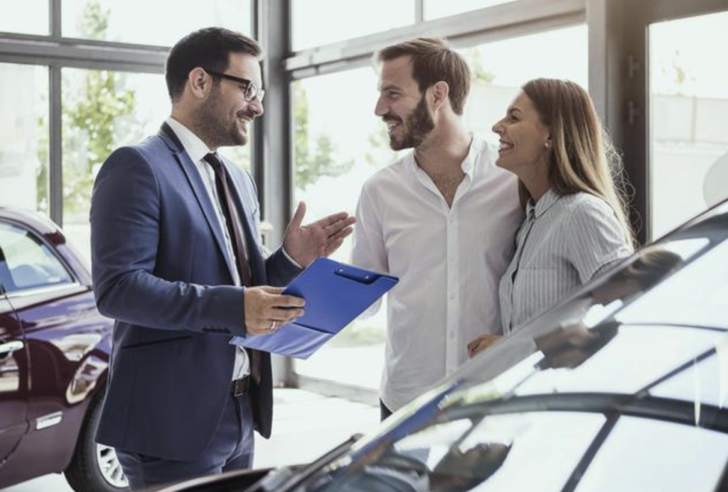 man explaining on-road costs